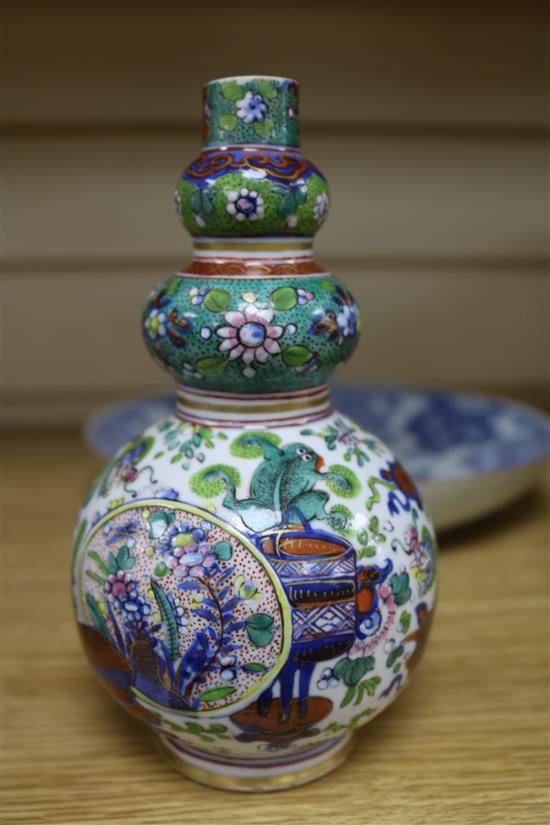 A Chinese enamel vase and two Chinese dishes